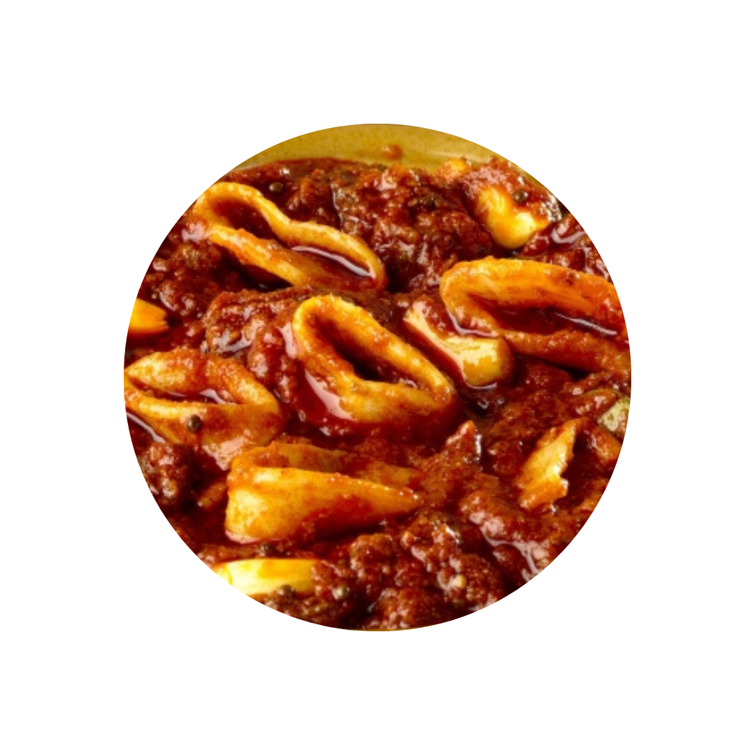 Close-up of Octorika squid pickle with tender squid rings coated in rich,  top Quality masala