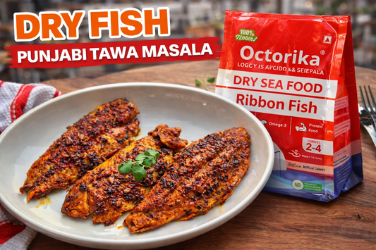 A delicious plate of Dry Fish Punjabi Tawa Masala served on a rustic wooden table, garnished with fresh coriander, with an Octorika dry ribbon fish packet placed stylishly behind the plate in a bright, appetizing restaurant-style setting.